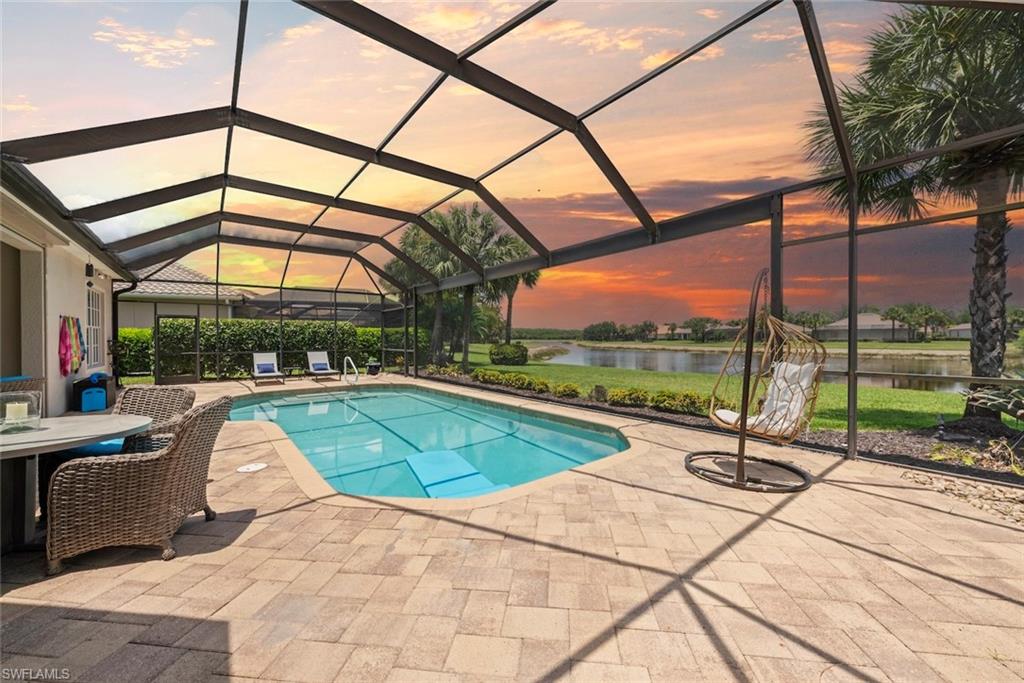 Screened lanai with a pool in Twin Eagles