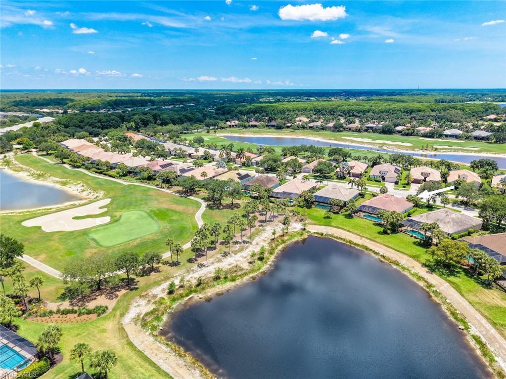 Aerial view of the home and Twin Eagles Golf Course