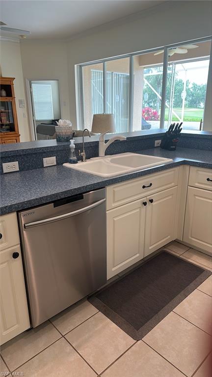 Kitchen area with sink and faucet