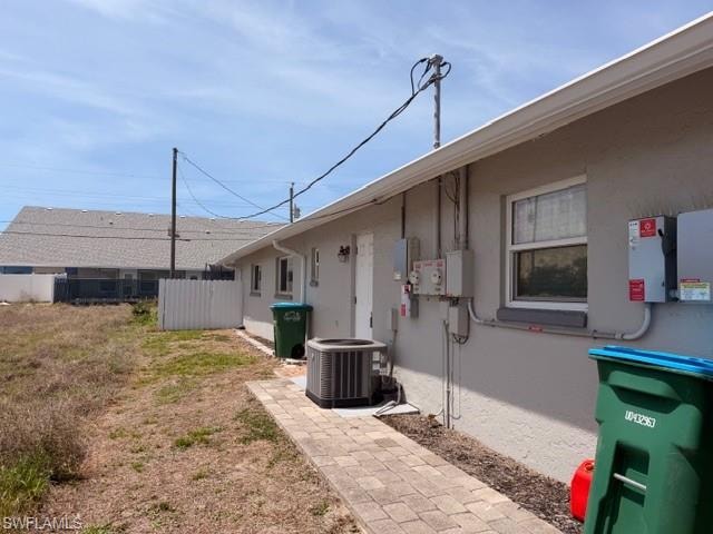 Rear view of the duplex showing the back exterior and outdoor space
