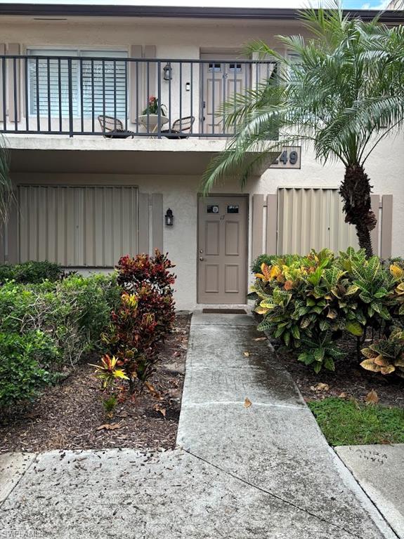 Entrance to property featuring a balcony