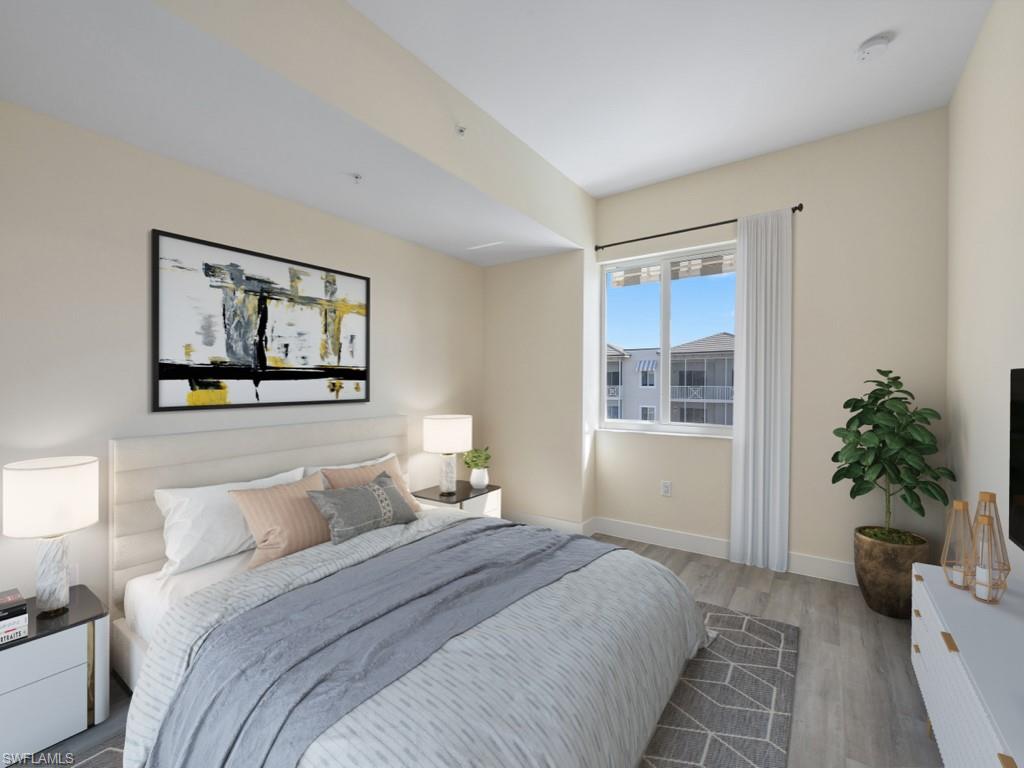 Virtually staged photo. Bedroom featuring vinyl flooring, a large window, and light-toned walls
