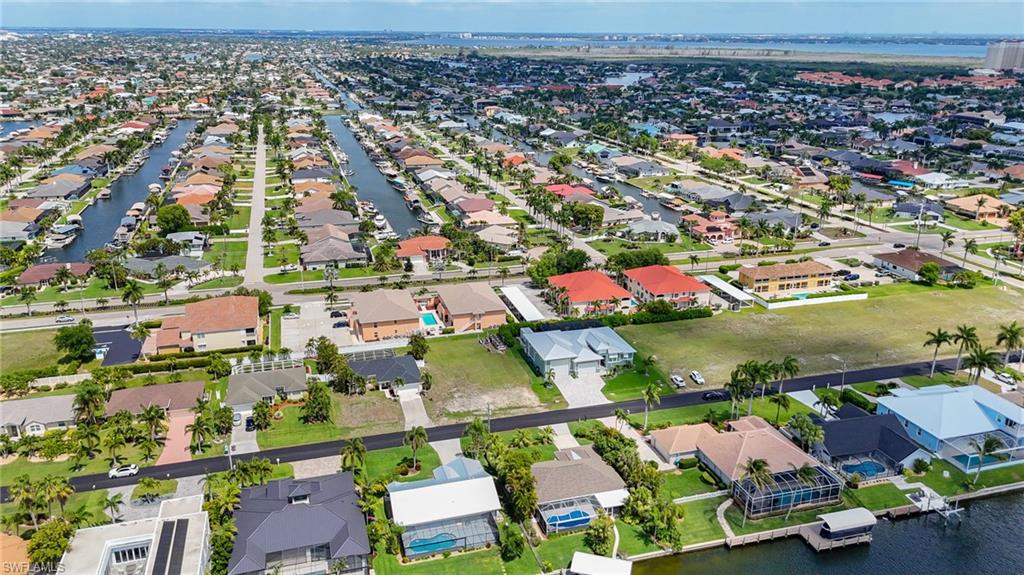 Aerial perspective showcasing a residential area with numerous single-family homes