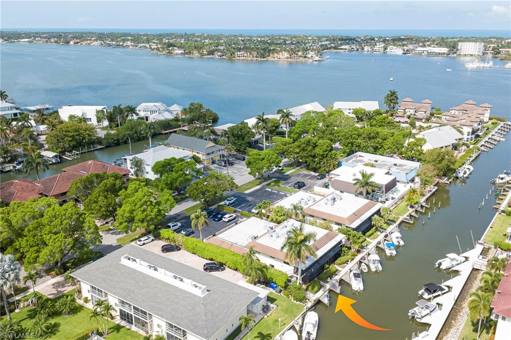 Waterfront property with direct canal access, featuring private boat docks