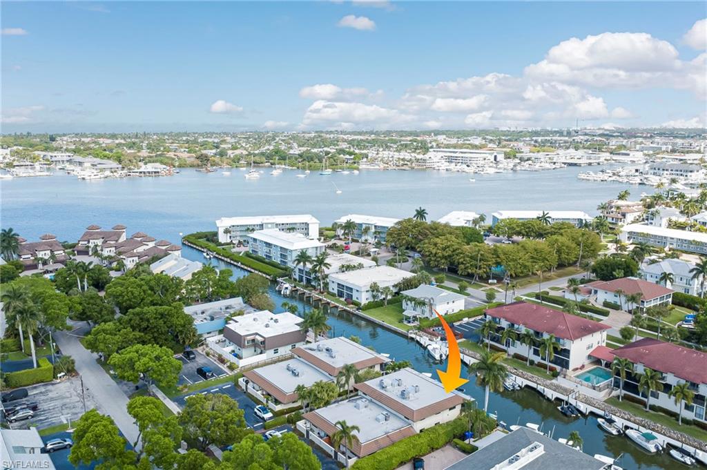 Waterfront property with direct canal access, featuring a private boat dock