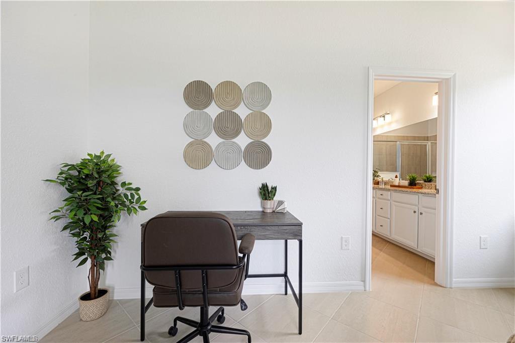 Neutral wall tones with tile flooring