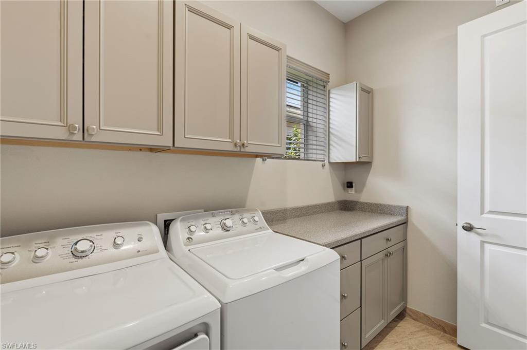 Laundry room with custom cabinets and laundry sink