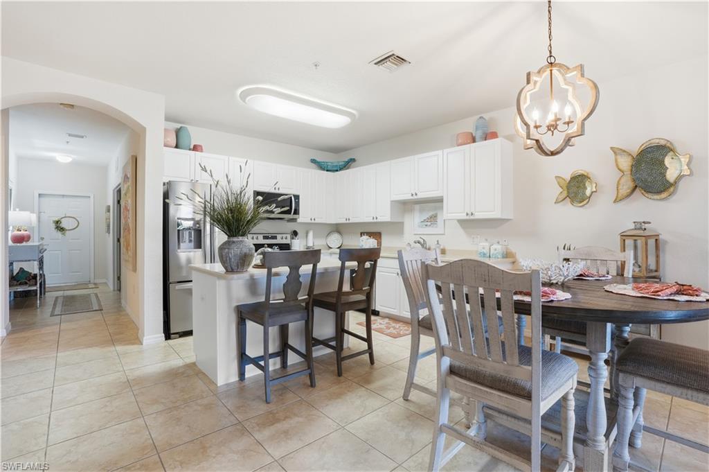 The breakfast bar serves as a casual dining spot.