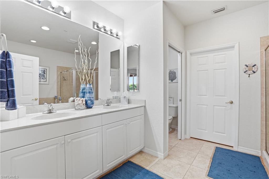 Primary ensuite with dual sinks.