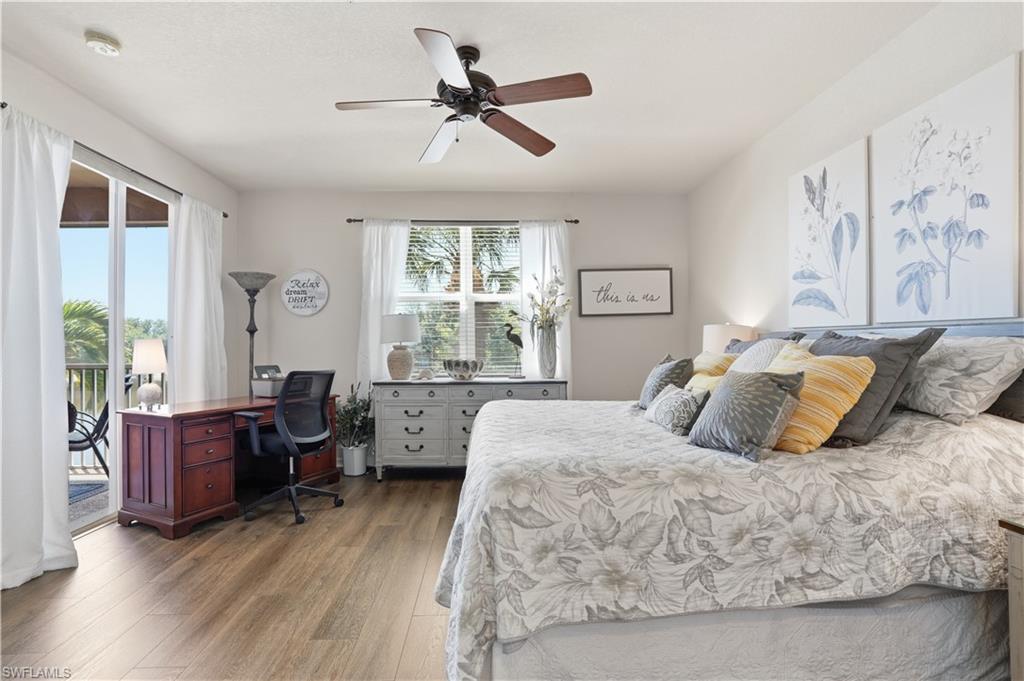 Primary ensuite with warm natural light and direct lanai access.