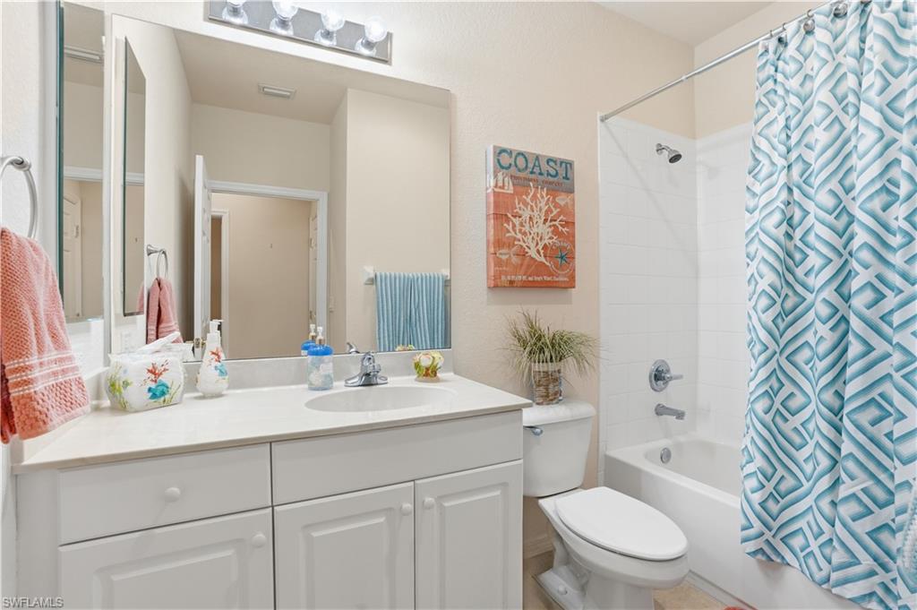 Guest bathroom with shower/tub combination.