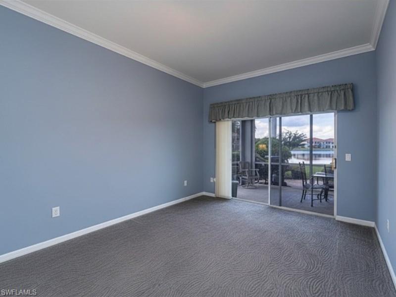 Master Suite with 2 walk in closets and it over looks the sunroom with a view