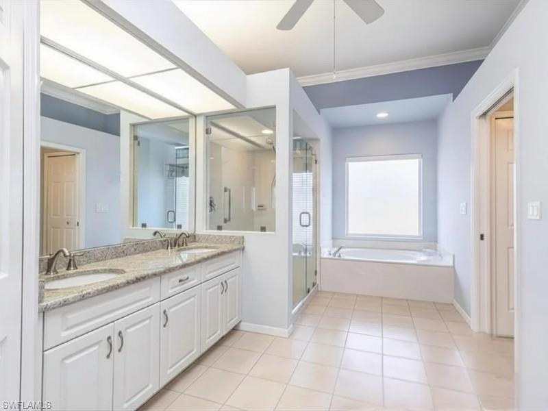 Master Bathroom Suite with double sinks and separate toilet room