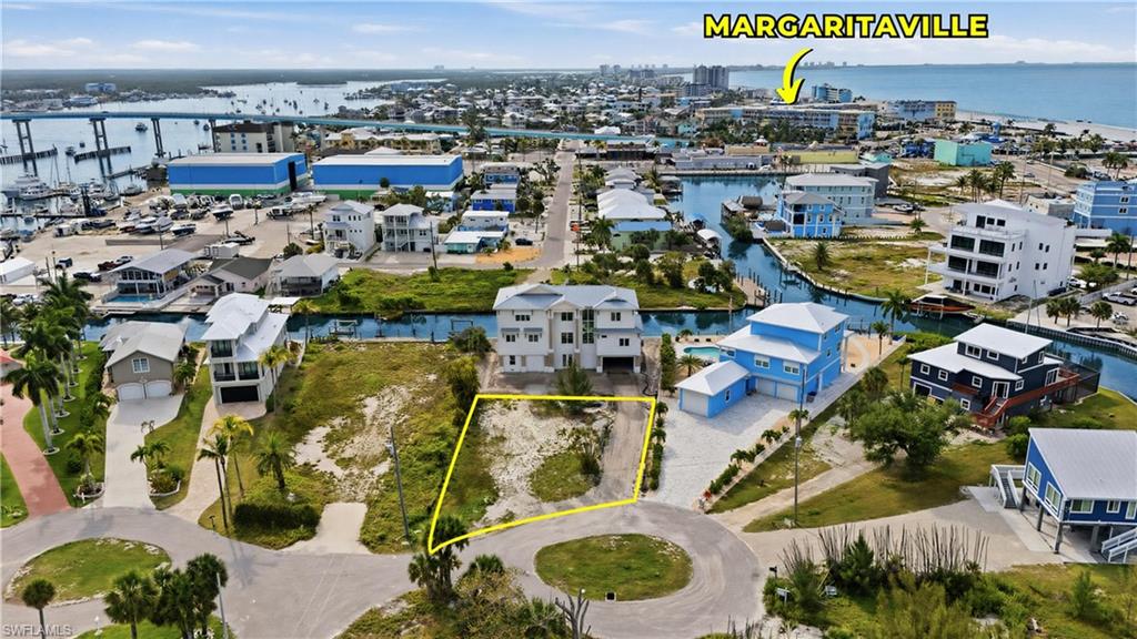 Vacant land parcel featuring a cul-de-sac location, surrounded by established residential properties - Virtually Edited Image