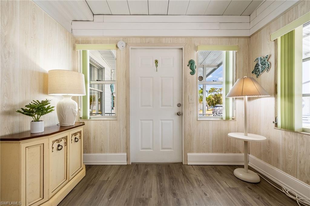 Front entrance enters into the den area.