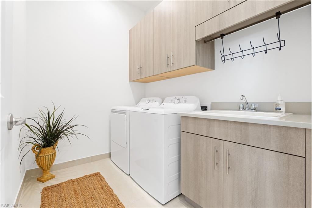 Custom cabinets and laundry sink.