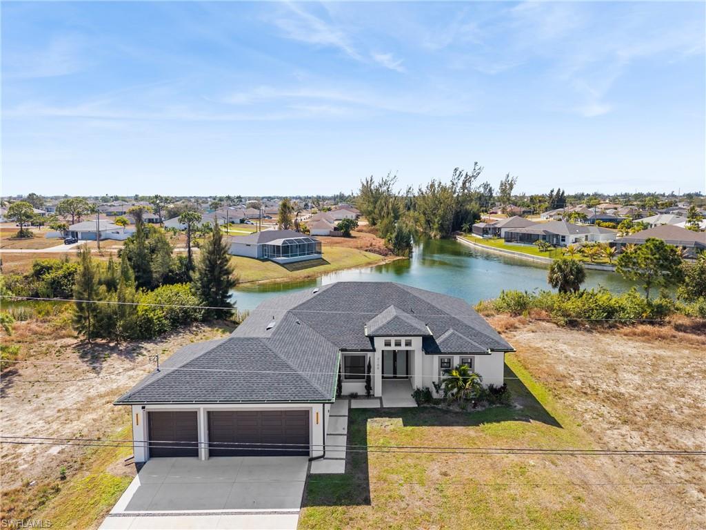 Aerial view of residential area with a large body of water