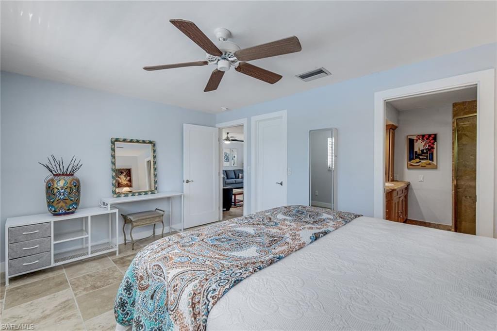 Primary suite is located just off the main living area.