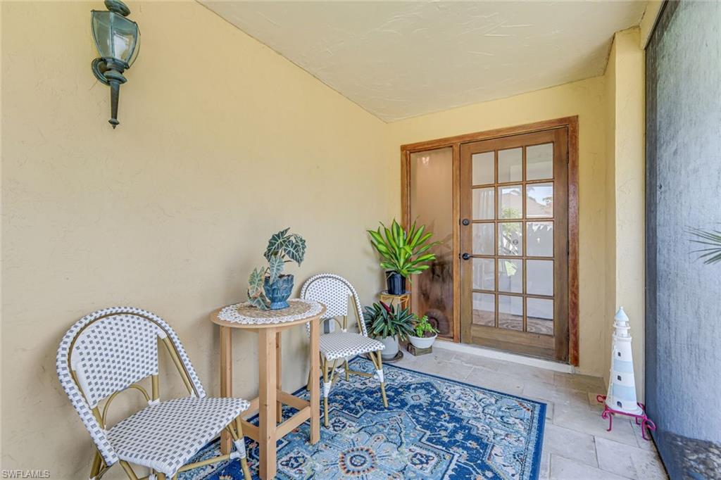 Main entry offers a private lanai, perfect for enjoying the sunset.