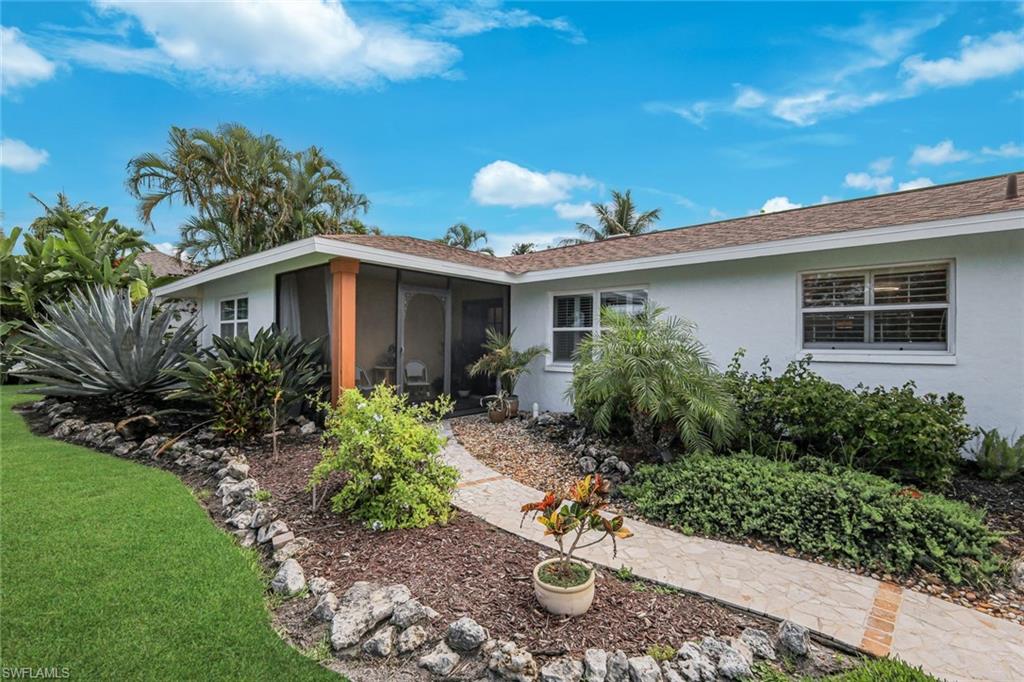Adorned by lush landscaping and so much privacy.