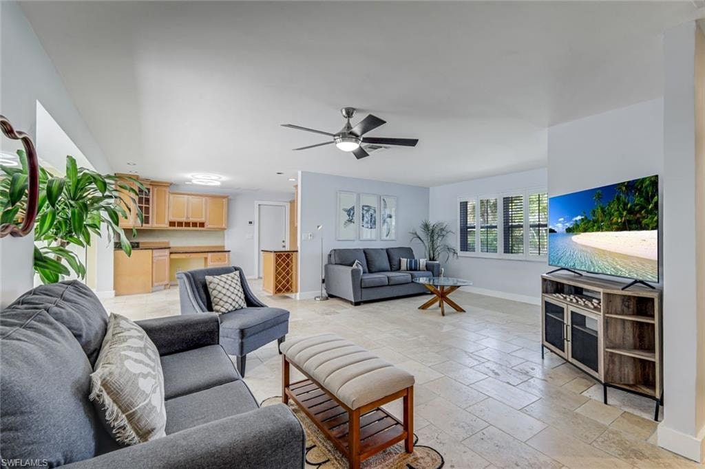 Kitchen and living room are open to one another.