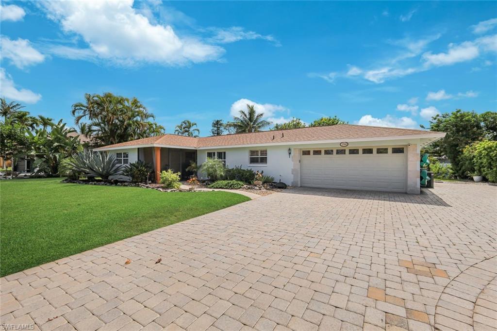 Additional parking to right of the home for RV, boats, cars and more!