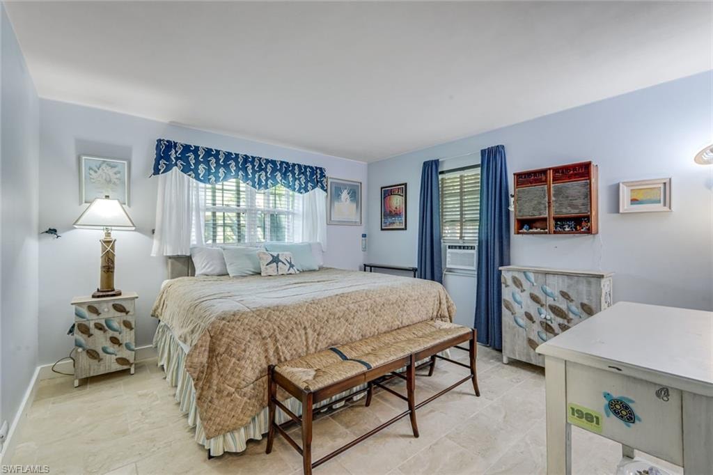 Guest bedroom is privately tucked away on the western side of the home.