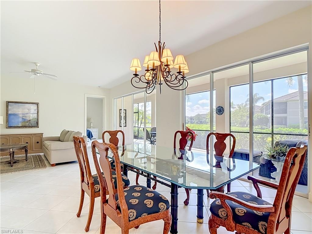 Expansive dining area featuring a chandelier and ceramic tile flooring