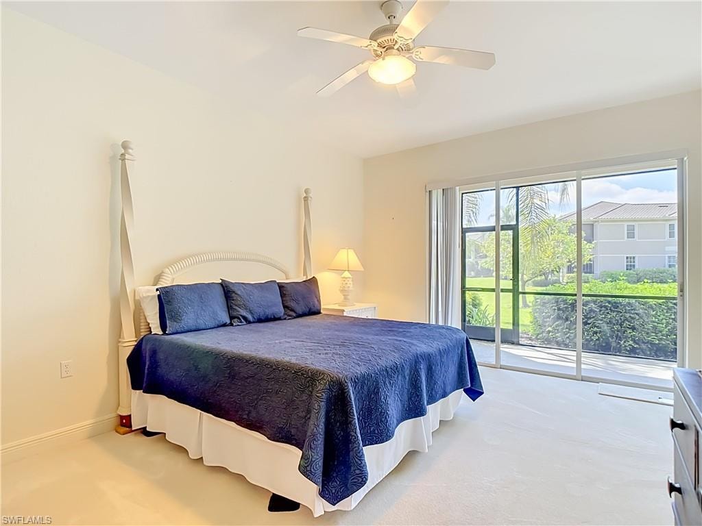 Spacious room featuring light-colored carpeting and a ceiling fan with integrated lighting