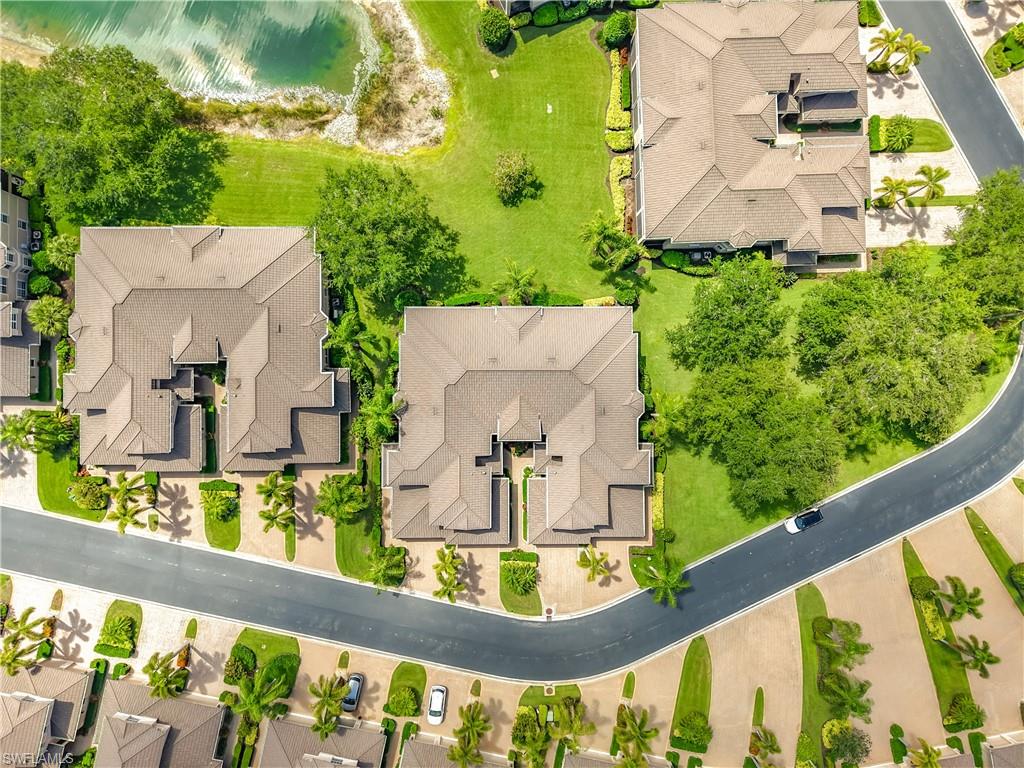 Aerial perspective showcasing residential buildings with multi-gabled roofs
