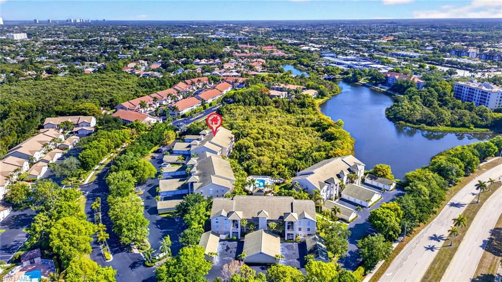 Aerial perspective showcasing a residential community with mature landscaping