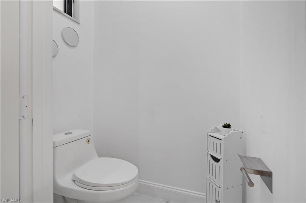 White toilet with a round seat