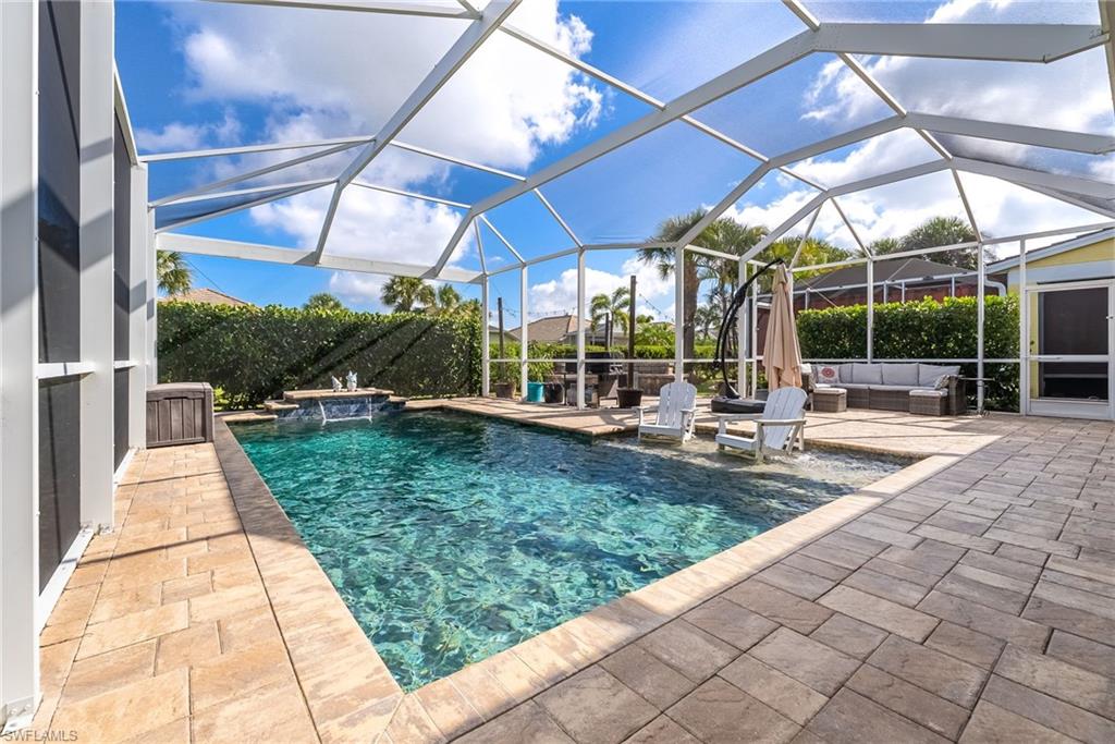 Amazing resort style pool and entertainment area under screening and fire pit area outside the screen. Heaven at home!