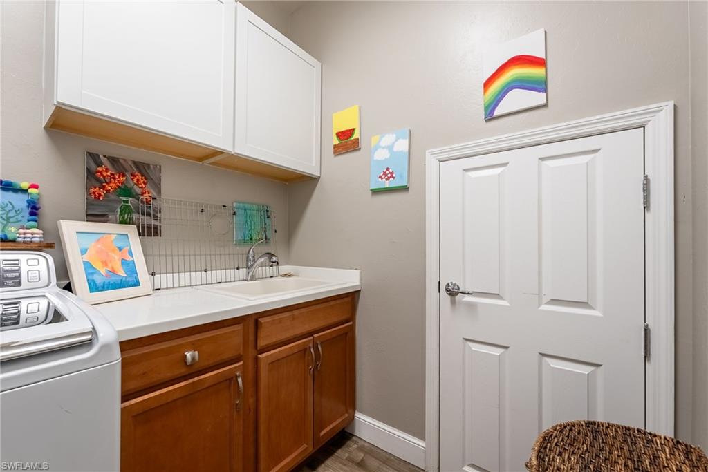 under stair access from laundry room