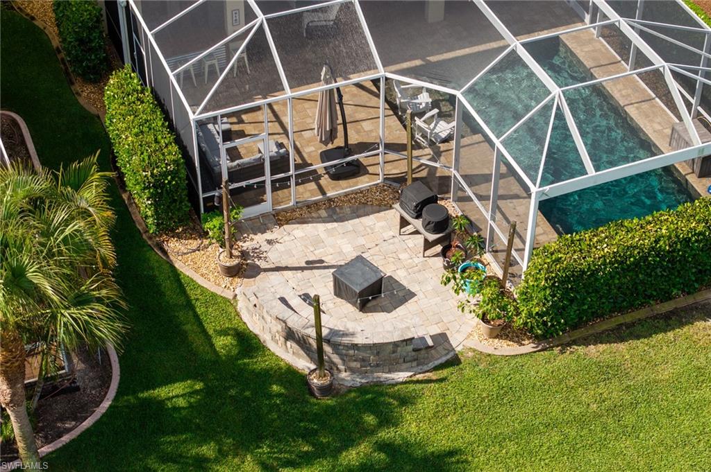 aerial of the pool/patio area  with attention to the fire pit area