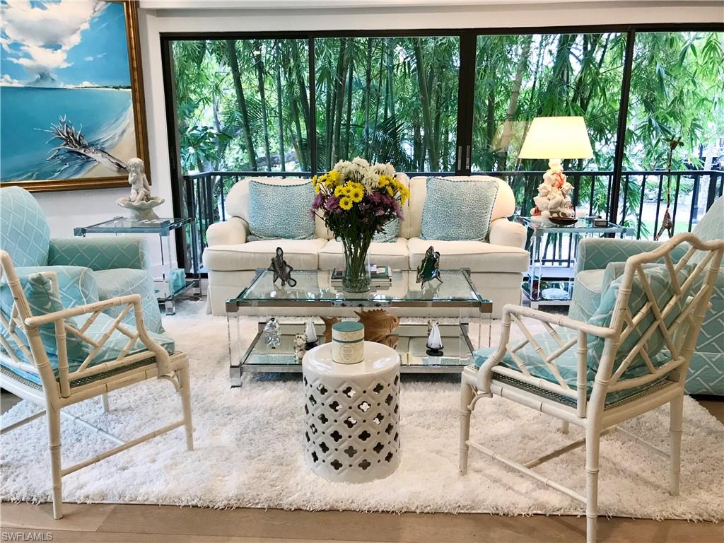 Sunroom / solarium featuring a healthy amount of sunlight