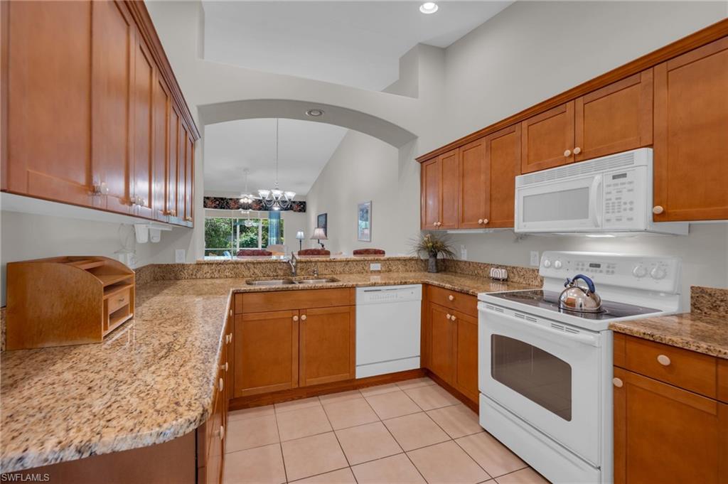Granite counters, wood cabinets