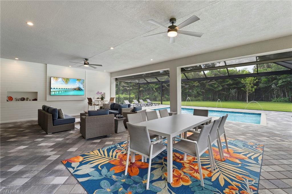 Feature wall with ship lap adds to the appeal of the outdoor living space.