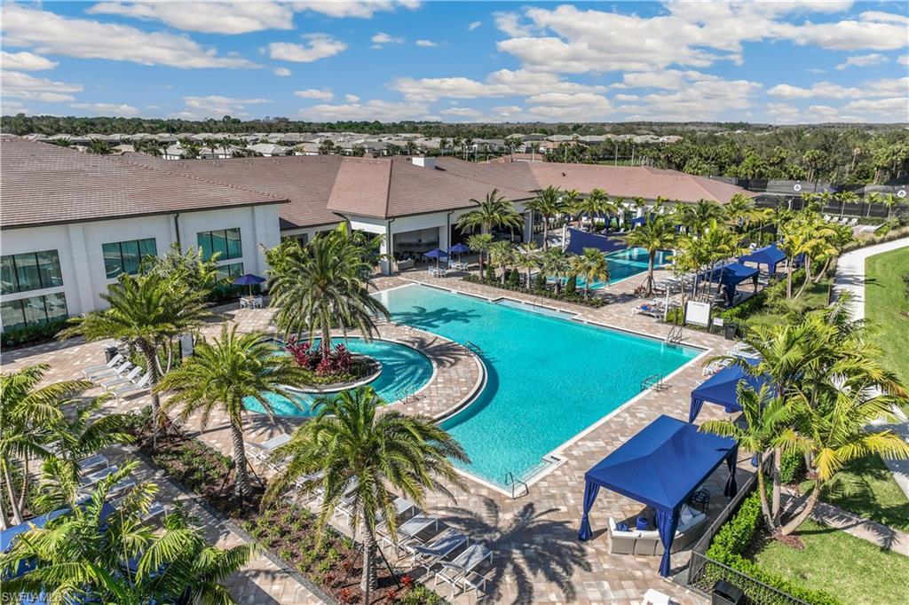 Resort pool with cabanas.