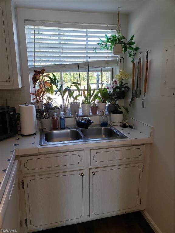 Kitchen sink overlooking the open area space outside