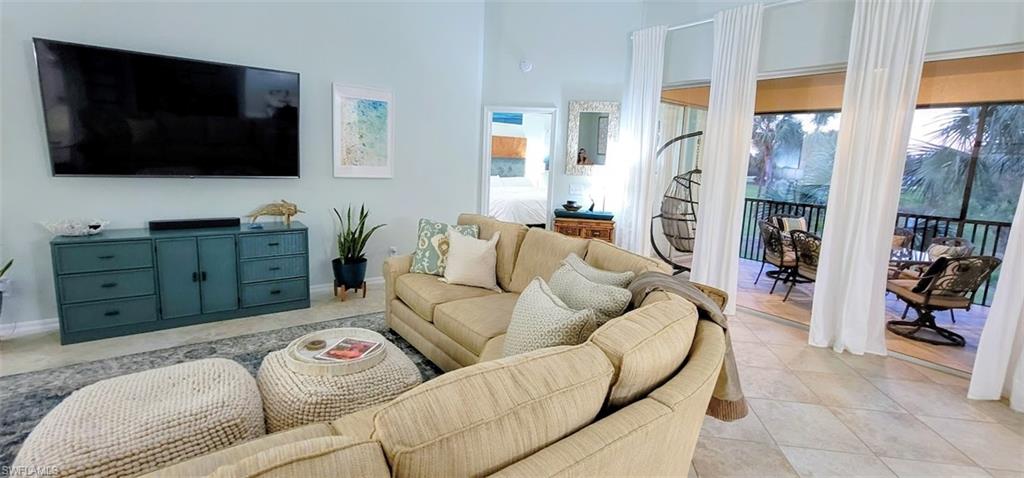 Large living room sectional with big screen TV