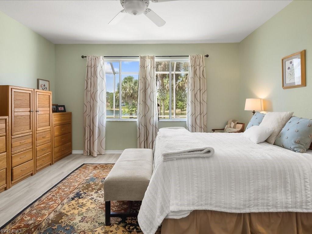 Expansive room with two large windows offering abundant natural light