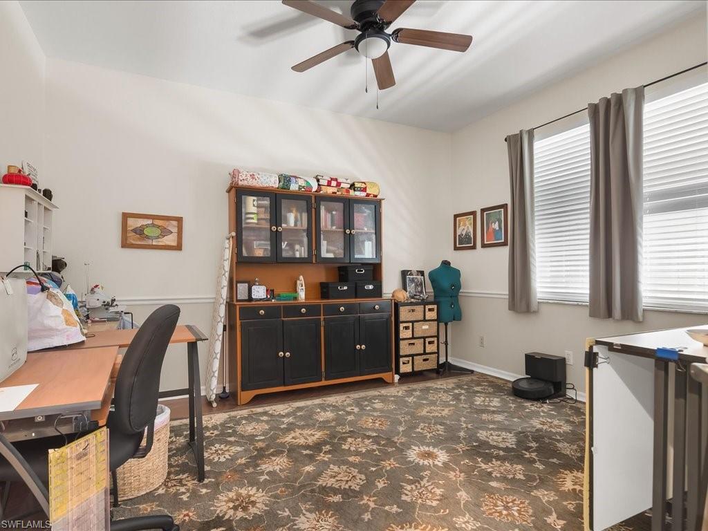 Vaulted ceilings with a ceiling fan, recessed lighting, and wood-finish flooring