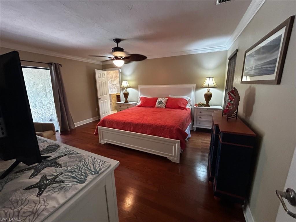 Rich wood-finish flooring complemented by neutral wall tones