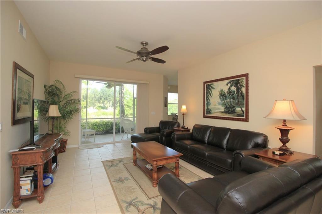 Tiled living room with ceiling fan