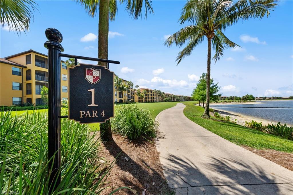Golf course setting with a paved pathway