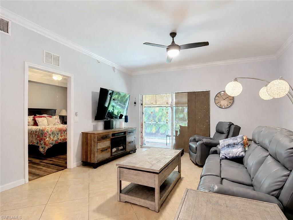 Light-toned tile flooring throughout the living space