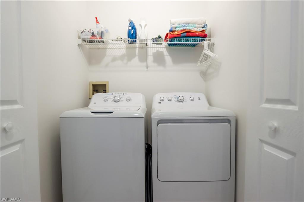 Laundry room featuring independent washer and dryer