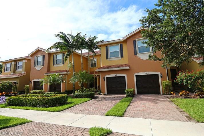 View of property with a garage