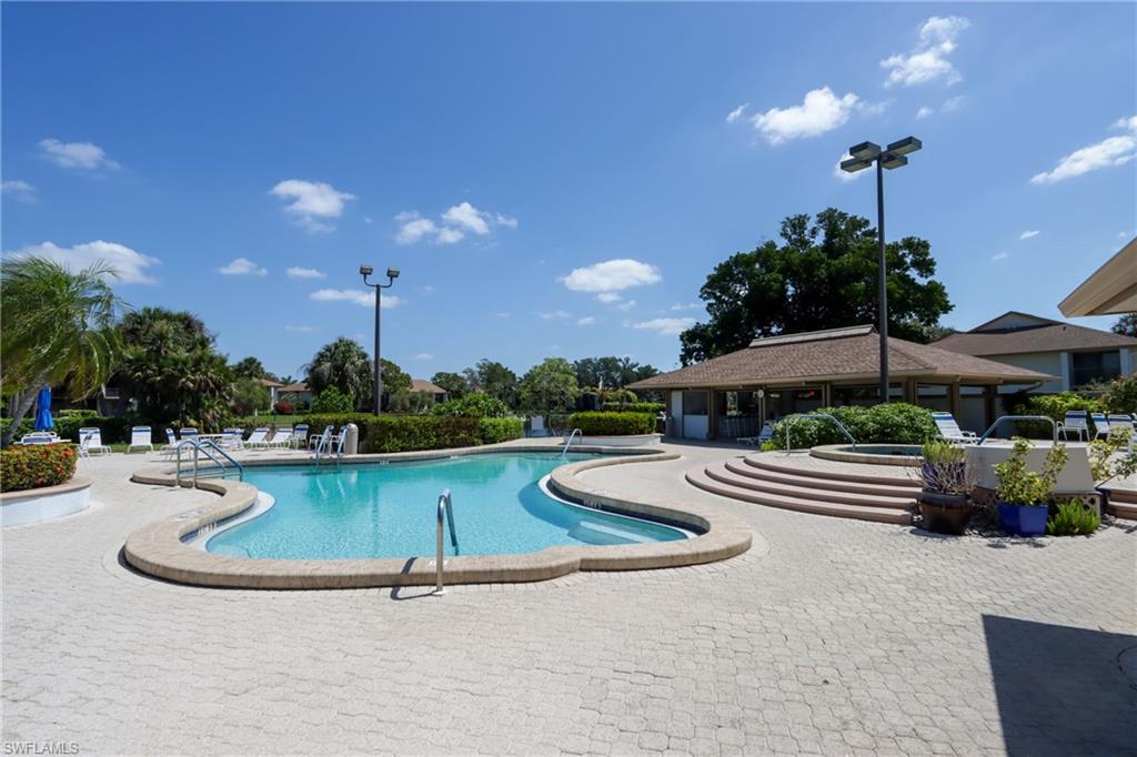 Community pool featuring a patio area